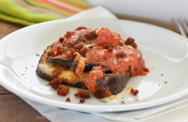 Baked eggplant topped with chorizo, cheese and tomato sauce.